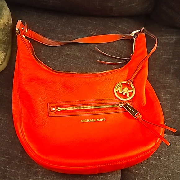 Orange Michael Kors hobo bag. - Picture 1 of 5